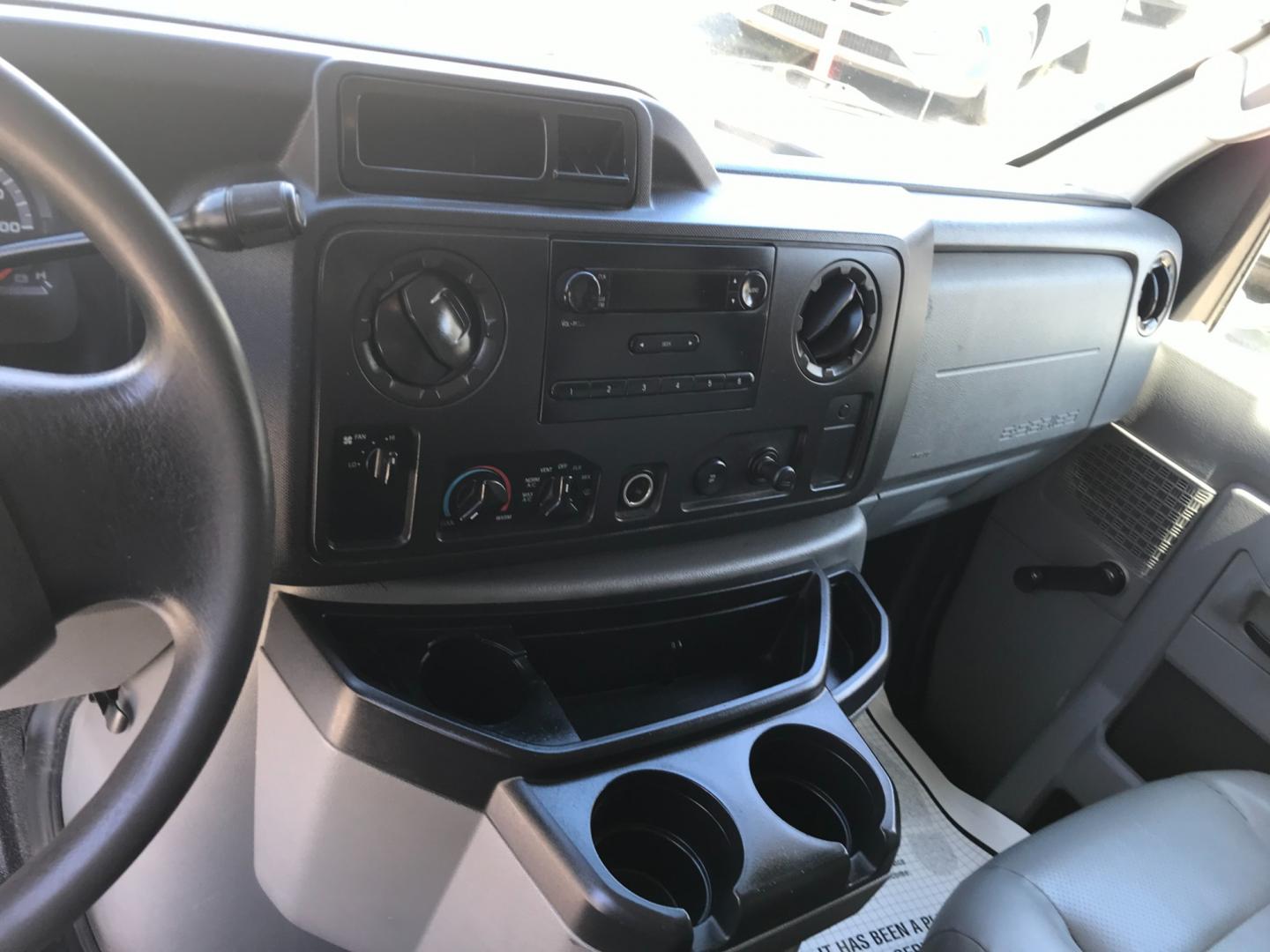 2011 Tan /Gray Ford E-Series Van E250 (1FTNE2EW5BD) with an 4.8 V8 engine, Automatic transmission, located at 577 Chester Pike, Prospect Park, PA, 19076, (610) 237-1015, 39.886154, -75.302338 - 2011 Ford E250 Cargo Van: Ladder racks, shelving, heavy duty partition, power inverter, fully metal body, FLEET MAINTAINED, runs LIKE NEW! This vehicle comes inspected and has been given a bumper to bumper safety check. It is very clean, reliable, and well maintained. We offer a unique pay plan t - Photo#13